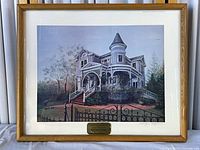 Full view of framed limited edition print under glass