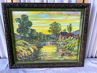 Full view of framed landscape painting