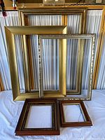 Front view of all six frames standing upright