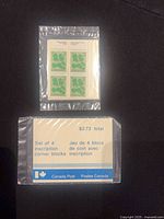 Front and back of sealed green wildlife 4-stamp block with $2.72 header