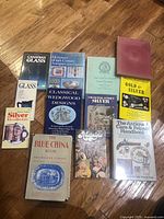 All 12 reference books laid out on floor