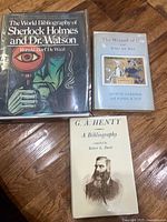 Front covers of the three books