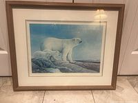 Framed polar bear print showing artwork, mat, and frame