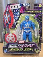 Front of sealed Captain America Mech Strike Monster Hunters action figure showing figure and shield accessory
