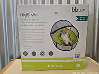 Front of sealed retail box showing product image and branding