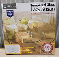 Front of boxed Eternal tempered glass lazy Susan showing size and features