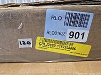 Shipping box with product label showing model CRLJ2820 16" Christmas Small Lighted Silver Wreath