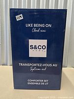 Front view of sealed Safdie & Co. S&CO Home comforter set box