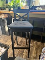 Full view of one bar chair