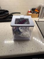 Tank with accessories inside