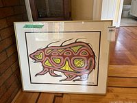 Front view of framed Aboriginal style artwork