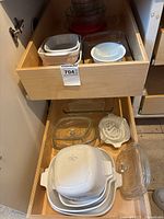 Drawer showing assorted CorningWare and Pyrex cookware