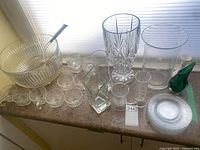 Overall lot showing punch set, vases, plates