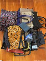 Pile of assorted bags showing colours, sizes and styles