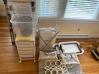 Overall view showing racks, cart, tote, hamper, fabric bins and baskets