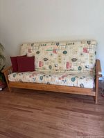 Front view of futon with pillows
