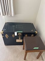 Steamer trunk and bench front view