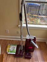 Full view of vacuum body, hose, wand, power head and bag pack