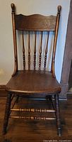 Full front view of antique wooden side chair