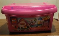 front of pink LEGO bin showing branding and 402-piece label