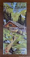 Illustrated cardboard sleeve front showing The Echo Harp branding and Made in Germany text