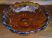 Top view showing amber glass bowl interior and scalloped rim