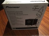 Box front showing Pioneer branding, model and features in English, French, Spanish, including design by Andrew Jones.