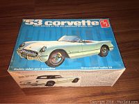 Top of the AMT '53 Corvette model kit box showing the illustration of the white 1953 Corvette convertible against a blue background.