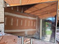 Front view of RCA 50" TV displaying intact screen