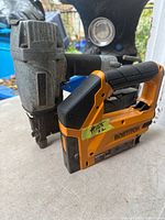 Both staplers side by side showing size and style