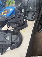 Overview of three pannier bags on table