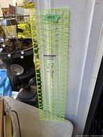 Full view of OmniAngle acrylic quilting ruler leaning upright