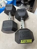 Top view of both 30 lb rubber hex dumbbells