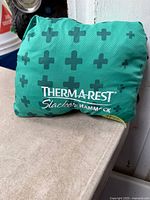 Stuff sack front displaying Therm-a-Rest Slacker Hammock logo and plus pattern