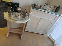 Cabinet and side table together