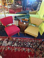 Overall view of violin set, metronome, side table, two chairs