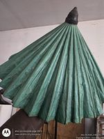 Exterior view of green paper umbrella canopy