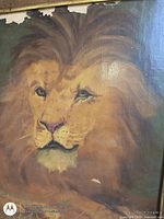 Close-up of lion head showing paint detail and losses