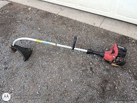 Full view of Homelite curved-shaft gas trimmer