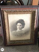 Framed portrait front view showing photograph and ornate frame