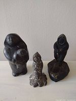 Group shot of three soapstone sculptures