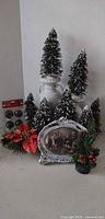 Group shot of trees, urn pillars, photo frame, floral picks and ornament pack