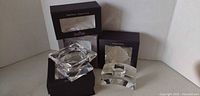 Four Rosenthal crystal candle holders with boxes