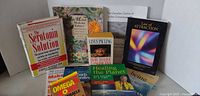Group shot of all ten health and wellness books