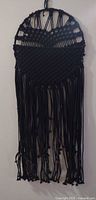 Full view of black macramé hanger without filler