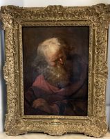 Frontal view of framed painting showing ornate gilt frame and artwork