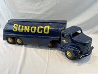 Left side view of Minnitoys Sunoco steel tanker truck