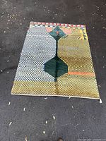 Full view of rug showing overall pattern and colours