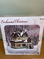 Front of boxed Pembroke Place village house