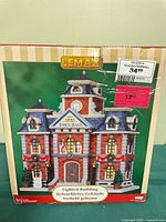 Front of boxed Lemax Town Hall building showing image of product and labels